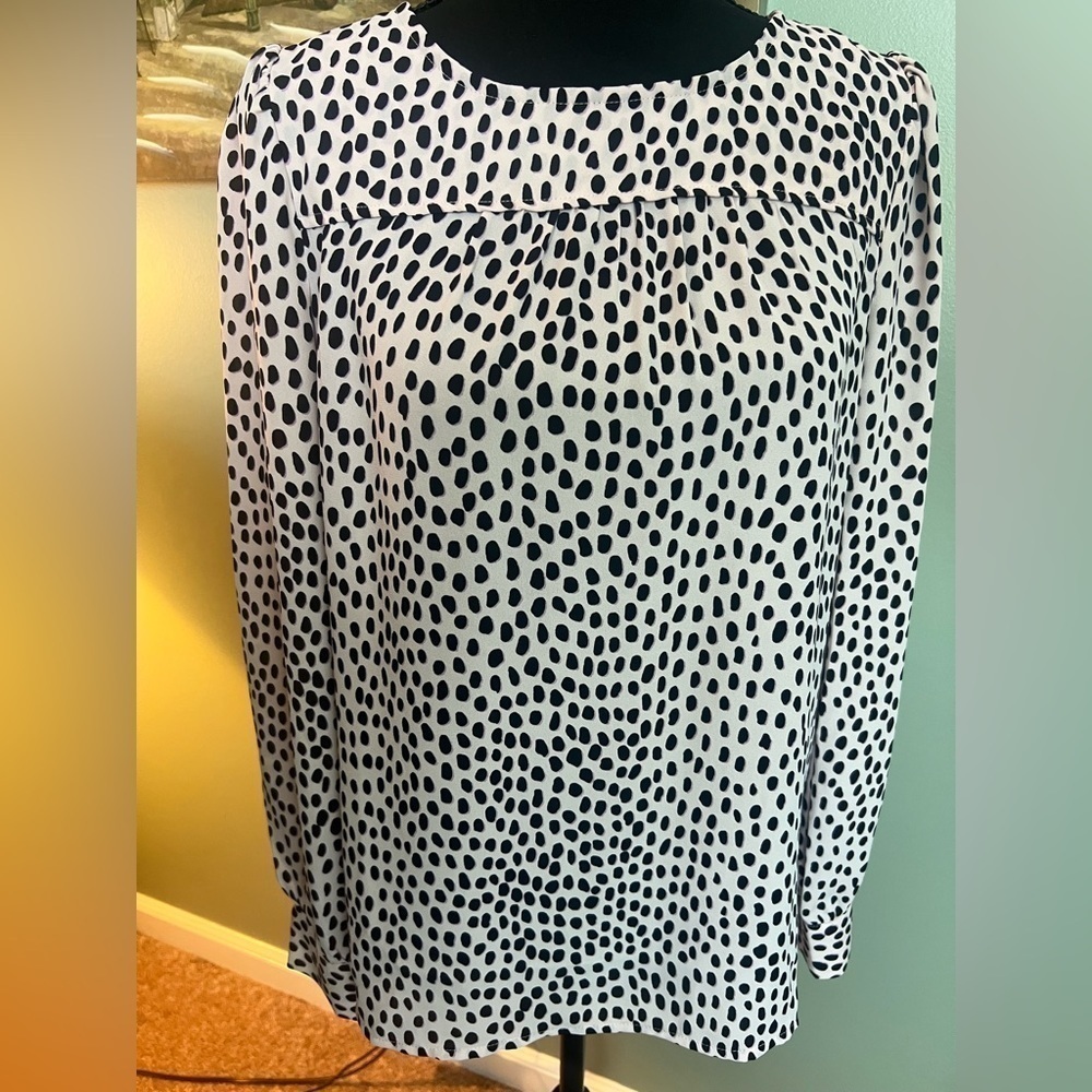 J Crew soft pink blouse with black print size XS.